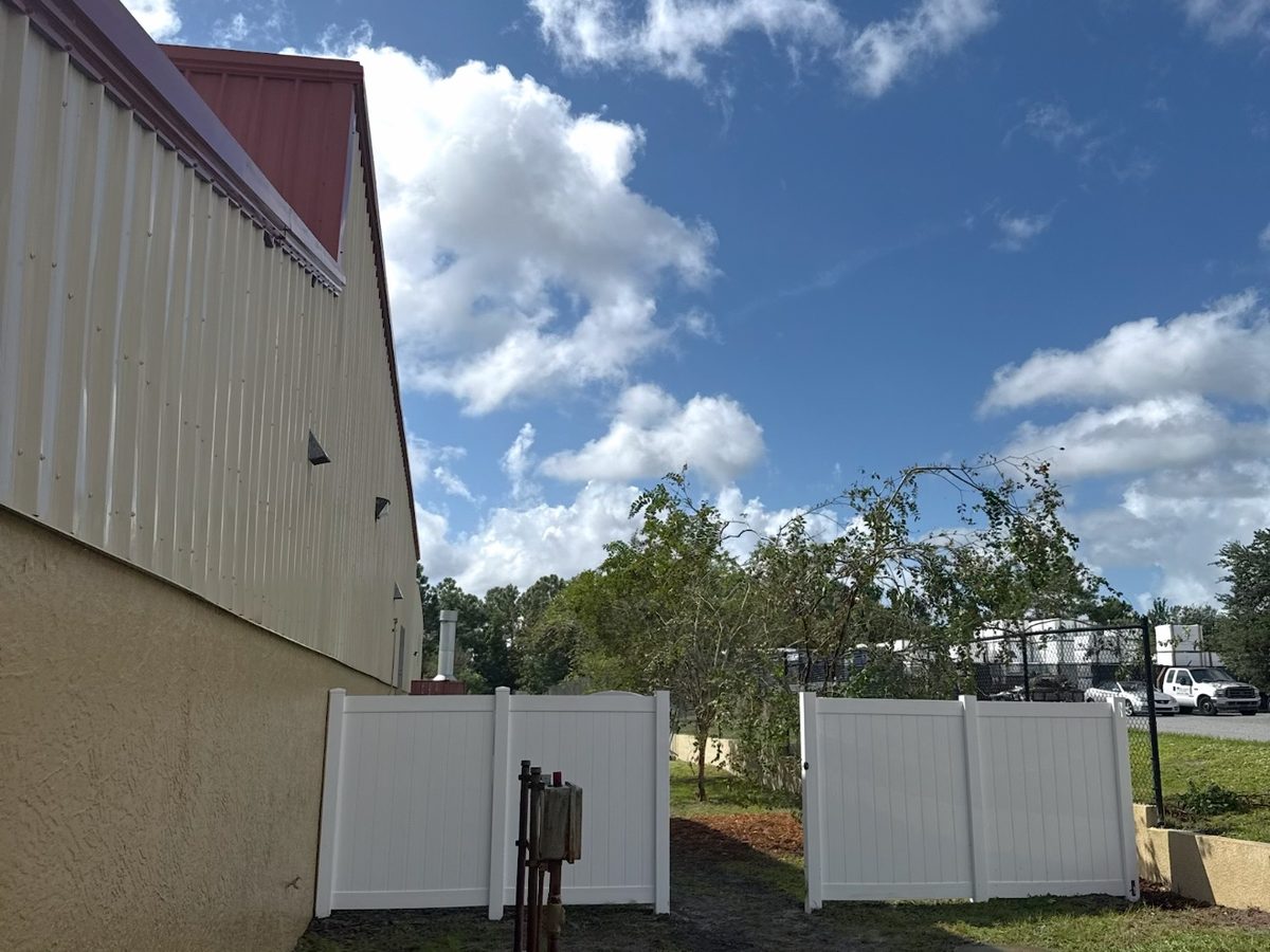 Clean white PVC fence after ProShine Squad fence cleaning