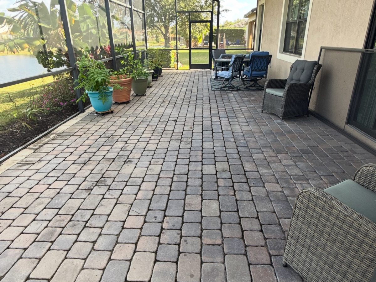 Dirty paver patio before ProShine Squad patio cleaning