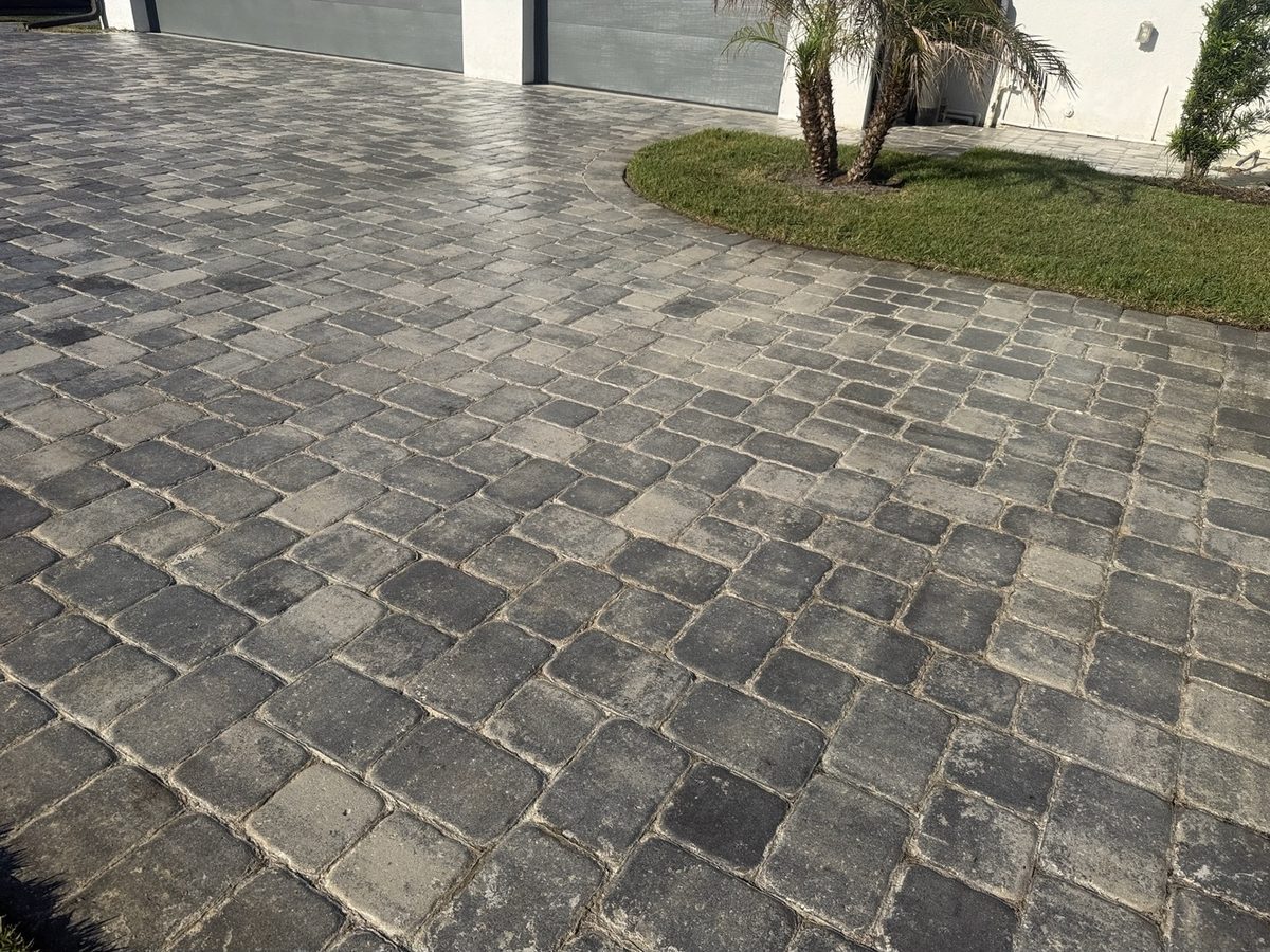 Paver driveway with fresh sealed finish by ProShine Squad